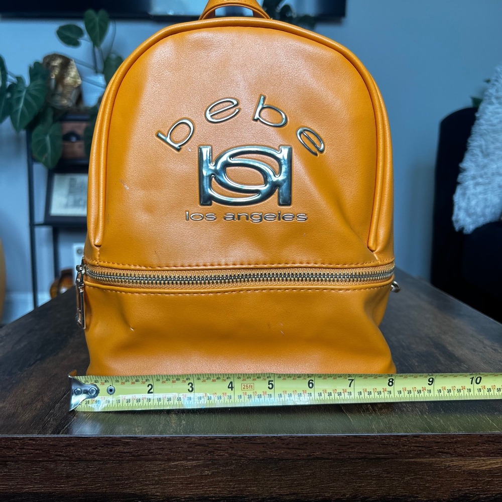 Bebe Kayla Small Backpack Women OS Apricot Orange NWT Faux Leather Mini Bag Logo - Picture 6 of 7